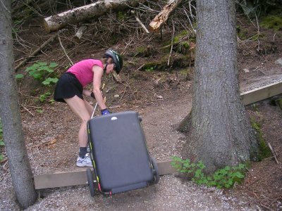 Terry, pulling trailer up trail stairs.
